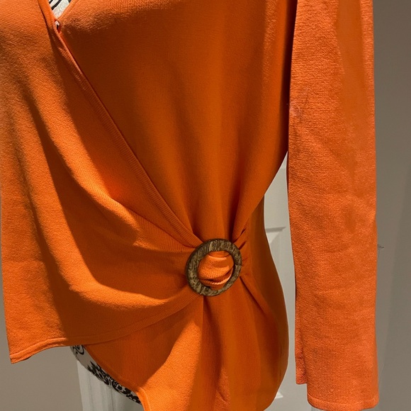 Beautiful wrap top in a striking tangerine color. - Picture 2 of 7